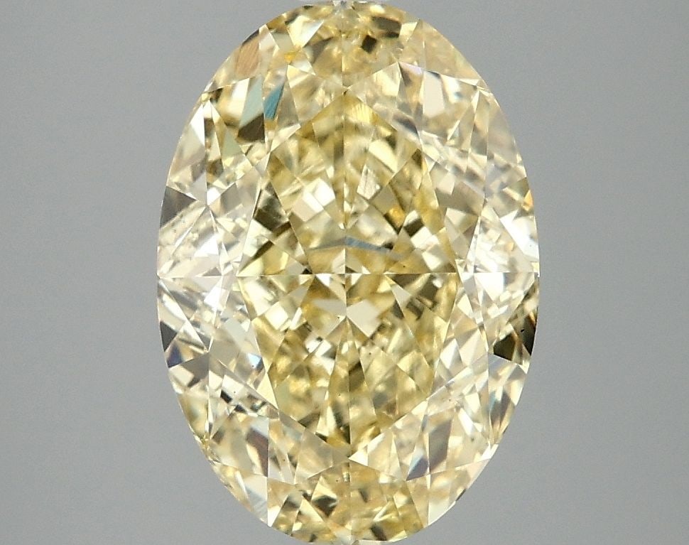 Loose Diamond - OVAL 4.0ct Fancy Vivid Yellow VS1: Loose Diamond - OVAL 4.0ct Fancy Vivid Yellow VS1 Source: This is a real non-mined Diamond that has been grown in a lab Shape: OVAL Carats: 4.0 Color: Fancy Vivid Yellow Certification: IGI Video: