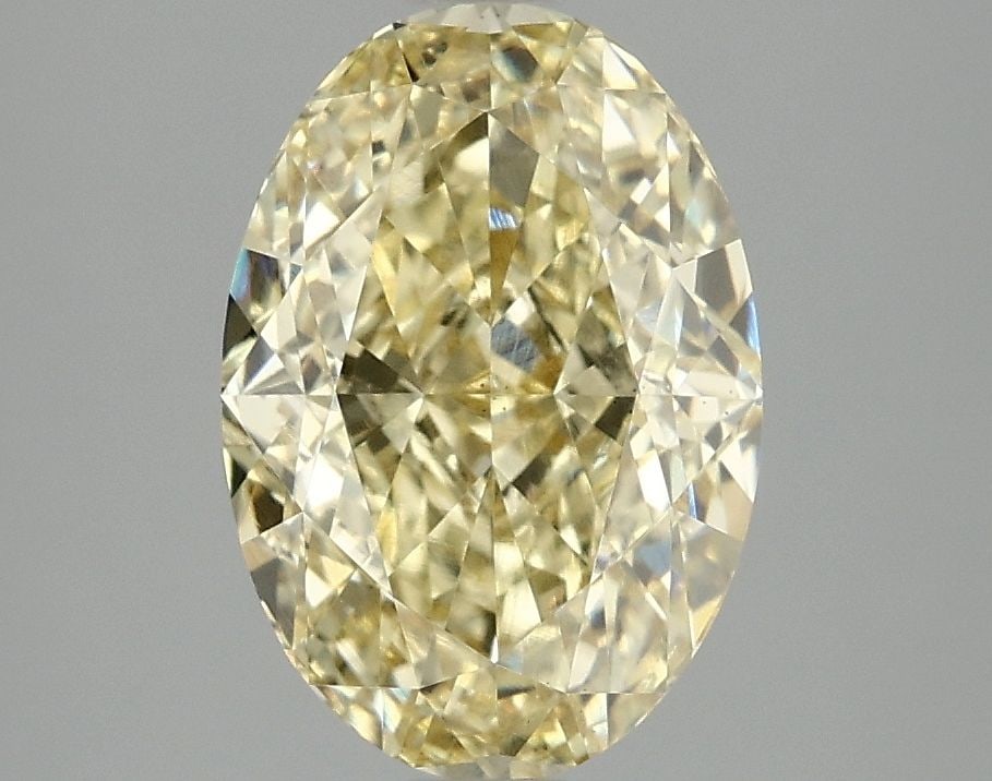 Loose Diamond - OVAL 3.05ct Fancy Vivid Yellow VS2: Loose Diamond - OVAL 3.05ct Fancy Vivid Yellow VS2 Source: This is a real non-mined Diamond that has been grown in a lab Shape: OVAL Carats: 3.05 Color: Fancy Vivid Yellow Certification: IGI Video: