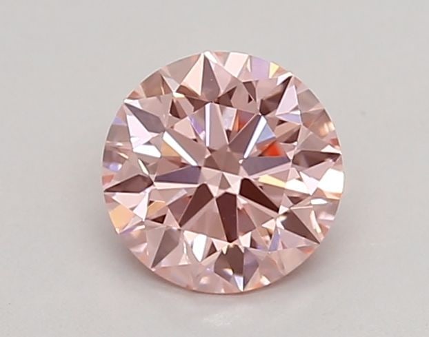 Loose Diamond - ROUND 0.67ct Fancy Intense Pink VS1: Loose Diamond - ROUND 0.67ct Fancy Intense Pink VS1 Source: This is a real non-mined Diamond that has been grown in a lab Shape: ROUND Carats: 0.67 Color: Fancy Intense Pink Certification: IGI Video: