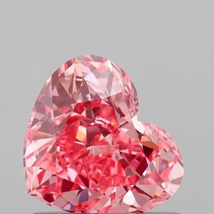 Loose Diamond - HEART 0.91ct Fancy Vivid Pink VS1: Loose Diamond - HEART 0.91ct Fancy Vivid Pink VS1 Source: This is a real non-mined Diamond that has been grown in a lab Shape: HEART Carats: 0.91 Color: Fancy Vivid Pink Certification: IGI Video: