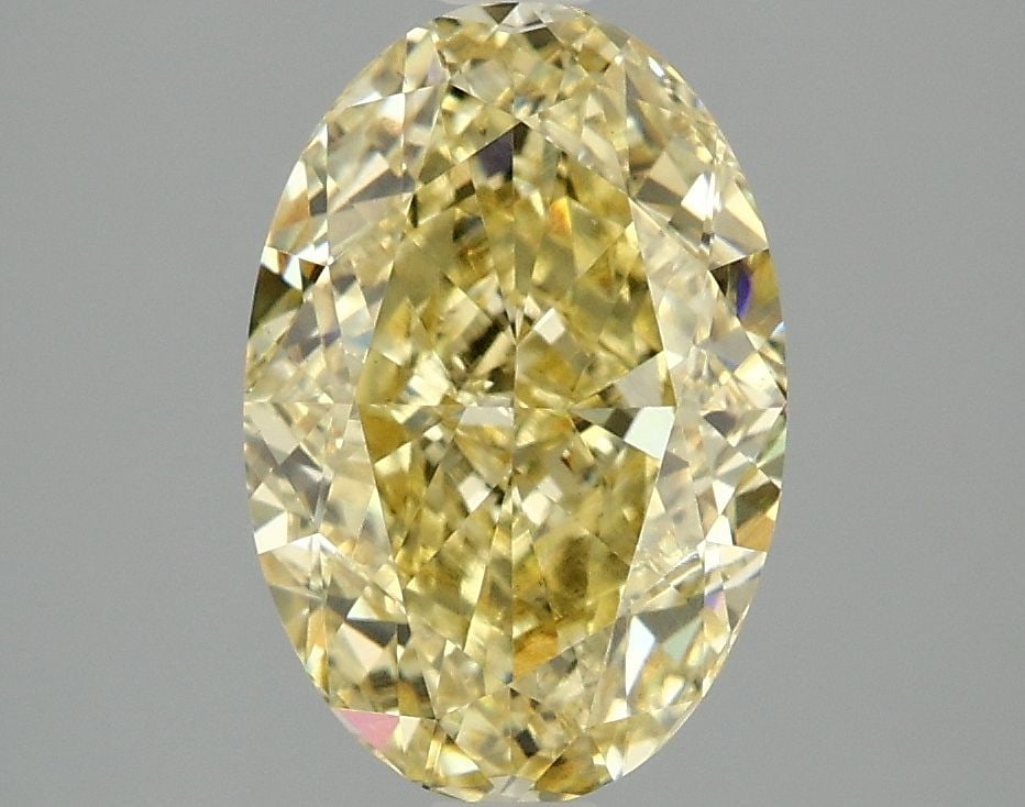 Loose Diamond - OVAL 3.06ct Fancy Vivid Yellow VS1: Loose Diamond - OVAL 3.06ct Fancy Vivid Yellow VS1 Source: This is a real non-mined Diamond that has been grown in a lab Shape: OVAL Carats: 3.06 Color: Fancy Vivid Yellow Certification: IGI Video:
