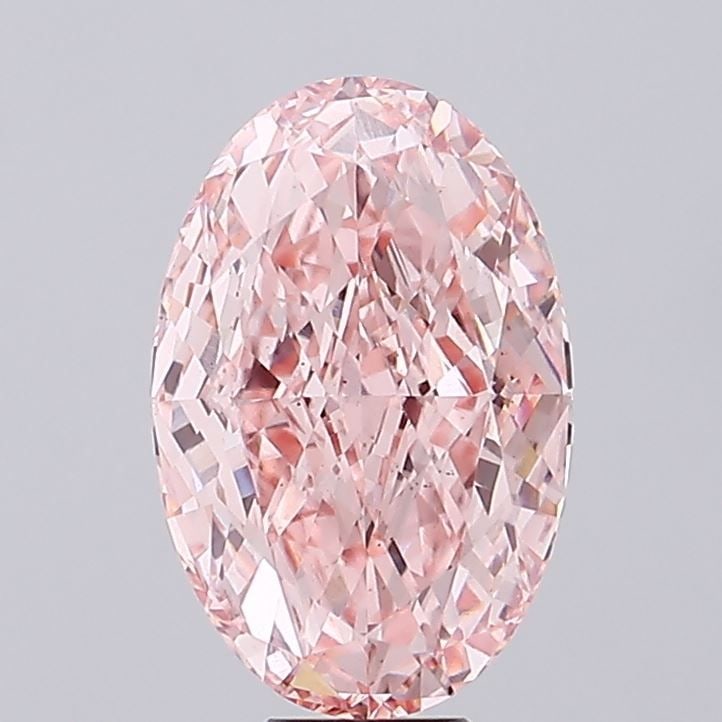 Loose Diamond - OVAL 11.09ct Fancy Vivid Pink VS2: Loose Diamond - OVAL 11.09ct Fancy Vivid Pink VS2 Source: This is a real non-mined Diamond that has been grown in a lab Shape: OVAL Carats: 11.09 Color: Fancy Vivid Pink Certification: IGI Video: