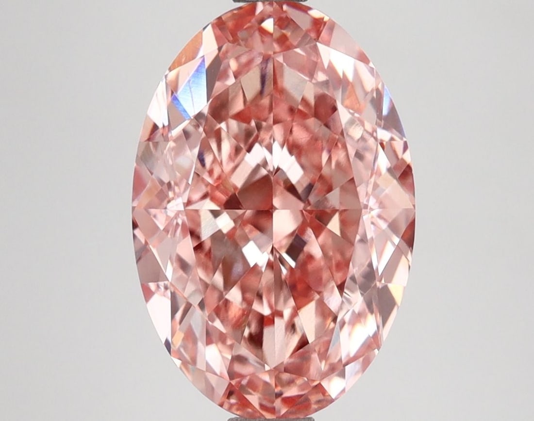 Loose Diamond - OVAL 3.95ct Fancy Vivid Pink VS1: Loose Diamond - OVAL 3.95ct Fancy Vivid Pink VS1 Source: This is a real non-mined Diamond that has been grown in a lab Shape: OVAL Carats: 3.95 Color: Fancy Vivid Pink Certification: IGI Video: