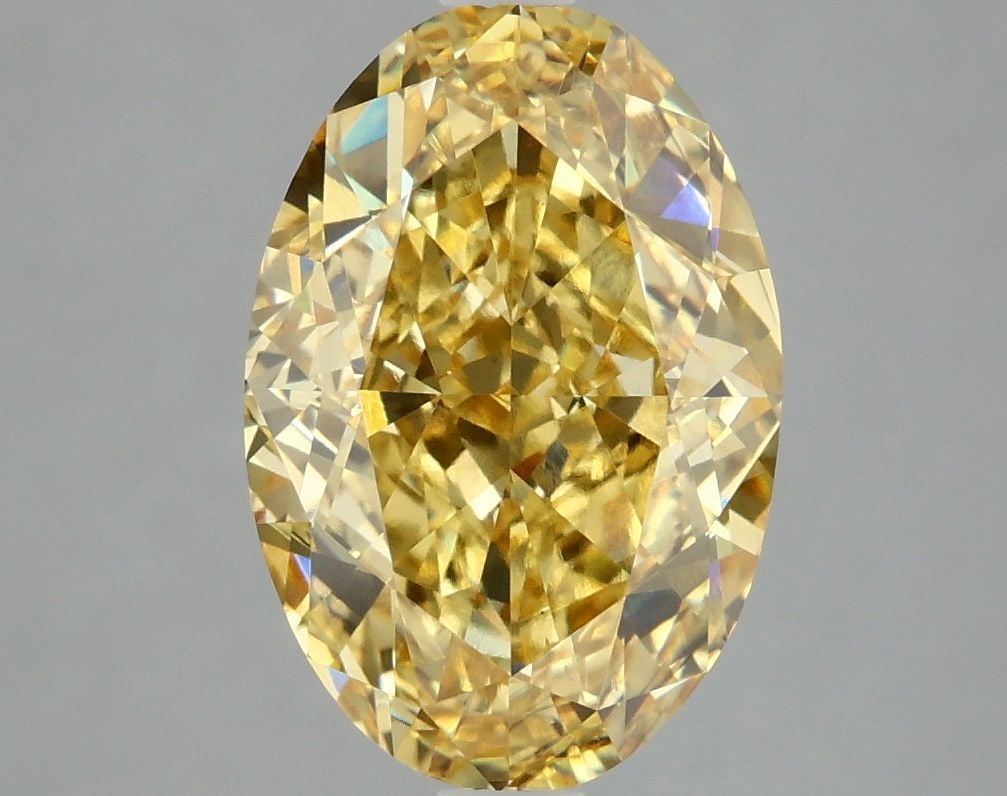 Loose Diamond - OVAL 3.84ct Fancy Vivid Yellow VS2: Loose Diamond - OVAL 3.84ct Fancy Vivid Yellow VS2 Source: This is a real non-mined Diamond that has been grown in a lab Shape: OVAL Carats: 3.84 Color: Fancy Vivid Yellow Certification: IGI Video: