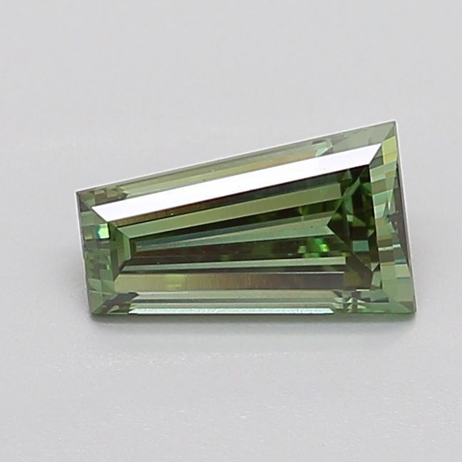 Loose Diamond - TAPERED BAGUETTE 0.79ct Fancy Vivid Green VVS2: Loose Diamond - TAPERED BAGUETTE 0.79ct Fancy Vivid Green VVS2 Source: This is a real non-mined Diamond that has been grown in a lab Shape: TAPERED BAGUETTE Carats: 0.79 Color: Fancy Vivid Green Certi