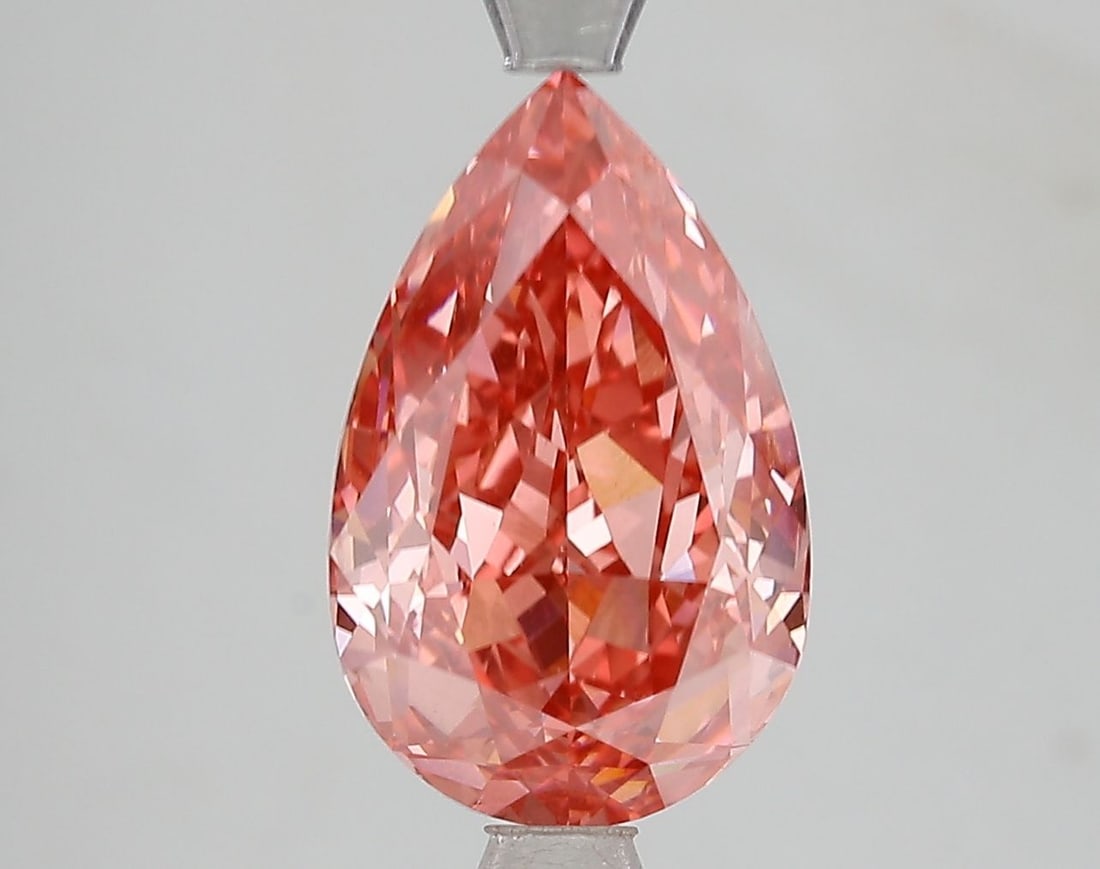 Loose Diamond - PEAR 3.6ct Fancy Vivid Pink VVS2: Loose Diamond - PEAR 3.6ct Fancy Vivid Pink VVS2 Source: This is a real non-mined Diamond that has been grown in a lab Shape: PEAR Carats: 3.6 Color: Fancy Vivid Pink Certification: IGI Video: