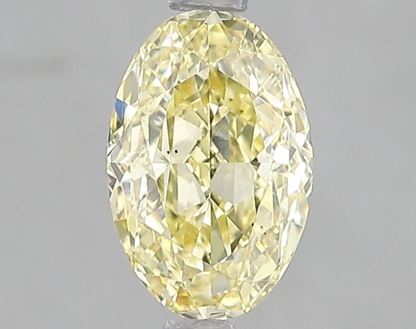 Loose Diamond - OVAL 1.56ct Fancy Intense Yellow VS1: Loose Diamond - OVAL 1.56ct Fancy Intense Yellow VS1 Source: This is a real non-mined Diamond that has been grown in a lab Shape: OVAL Carats: 1.56 Color: Fancy Intense Yellow Certification: IGI Video