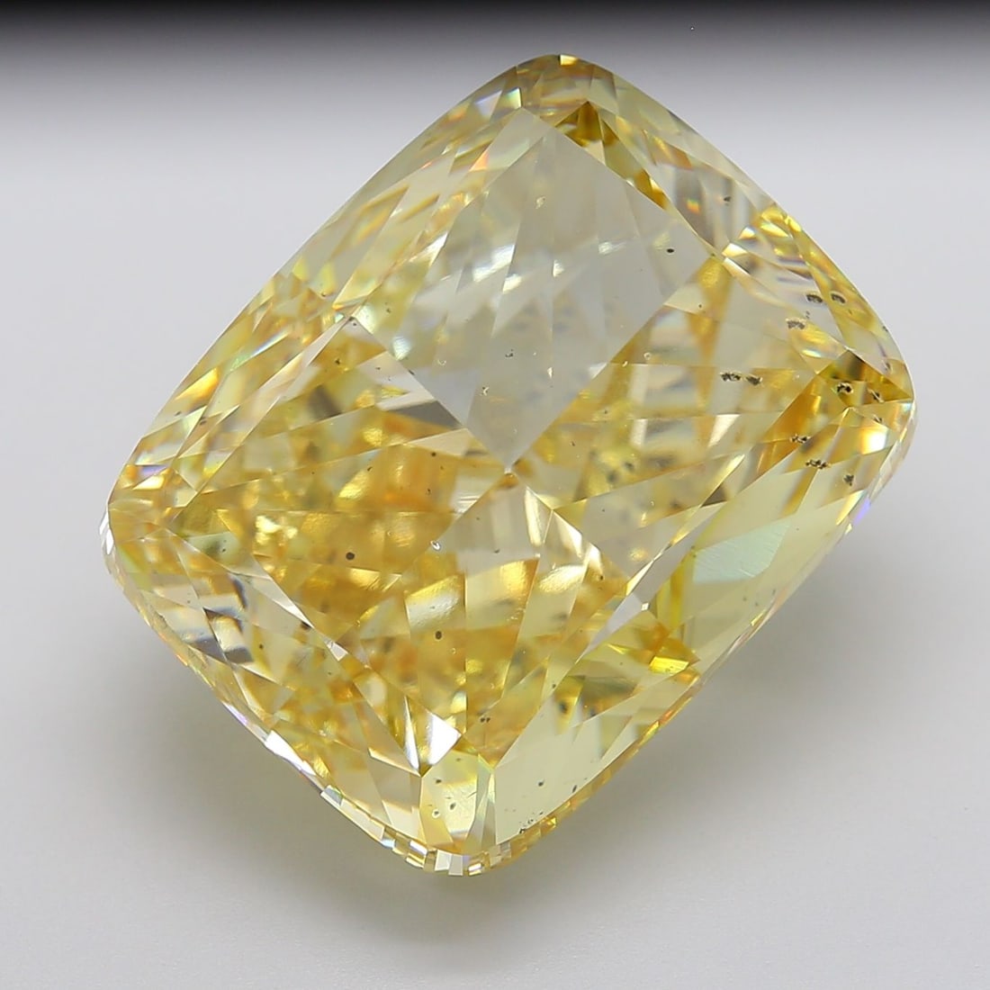 Loose Diamond - CUSHION MODIFIED 50.13ct Fancy Intense Yellow SI1: Loose Diamond - CUSHION MODIFIED 50.13ct Fancy Intense Yellow SI1 Source: This is a real non-mined Diamond that has been grown in a lab Shape: CUSHION MODIFIED Carats: 50.13 Color: Fancy Intense Yello