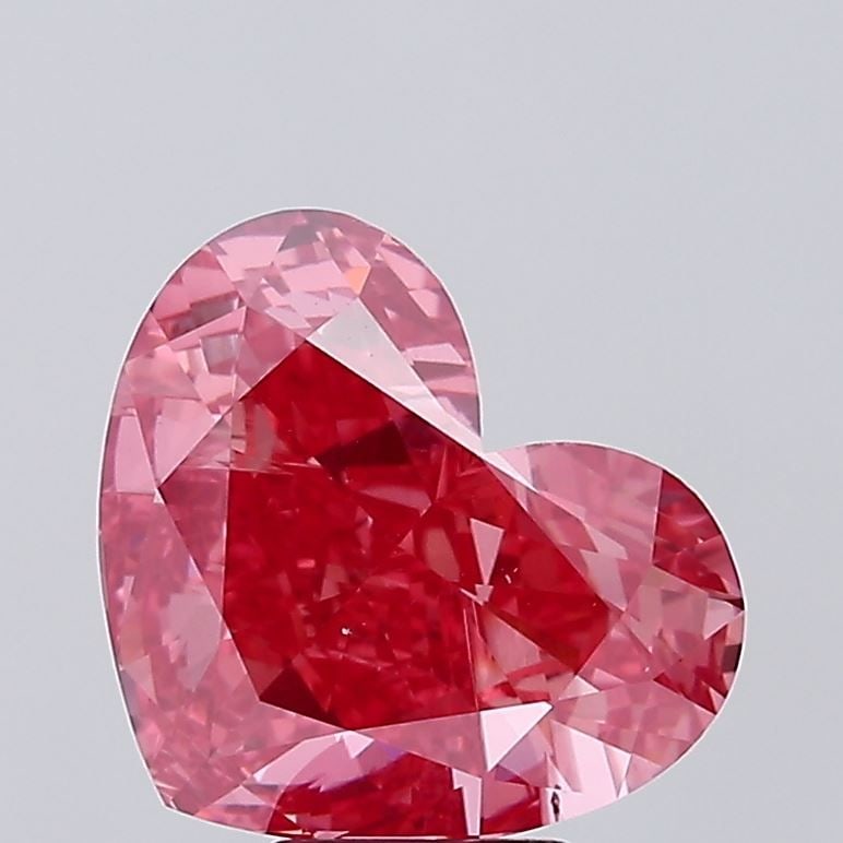 Loose Diamond - HEART 6.97ct Fancy Vivid Pink VS1: Loose Diamond - HEART 6.97ct Fancy Vivid Pink VS1 Source: This is a real non-mined Diamond that has been grown in a lab Shape: HEART Carats: 6.97 Color: Fancy Vivid Pink Certification: IGI Video: