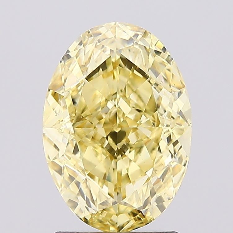 Loose Diamond - OVAL 2.1ct Fancy Intense Yellow VS2: Loose Diamond - OVAL 2.1ct Fancy Intense Yellow VS2 Source: This is a real non-mined Diamond that has been grown in a lab Shape: OVAL Carats: 2.1 Color: Fancy Intense Yellow Certification: IGI Video: