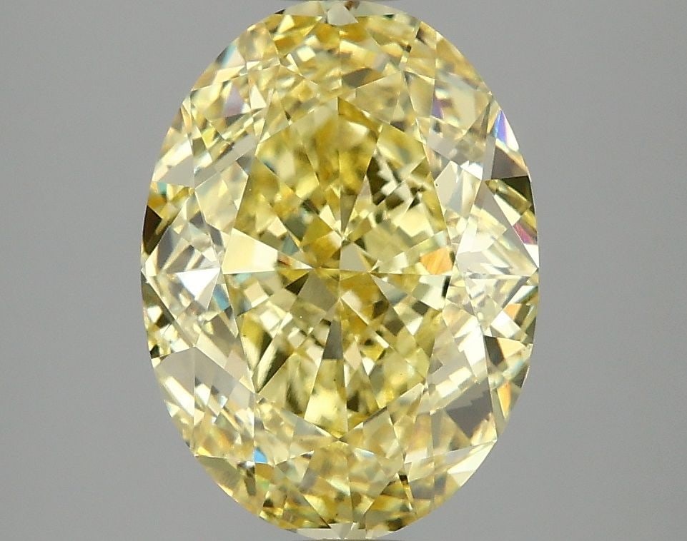 Loose Diamond - OVAL 4.09ct Fancy Vivid Yellow VS1: Loose Diamond - OVAL 4.09ct Fancy Vivid Yellow VS1 Source: This is a real non-mined Diamond that has been grown in a lab Shape: OVAL Carats: 4.09 Color: Fancy Vivid Yellow Certification: IGI Video: