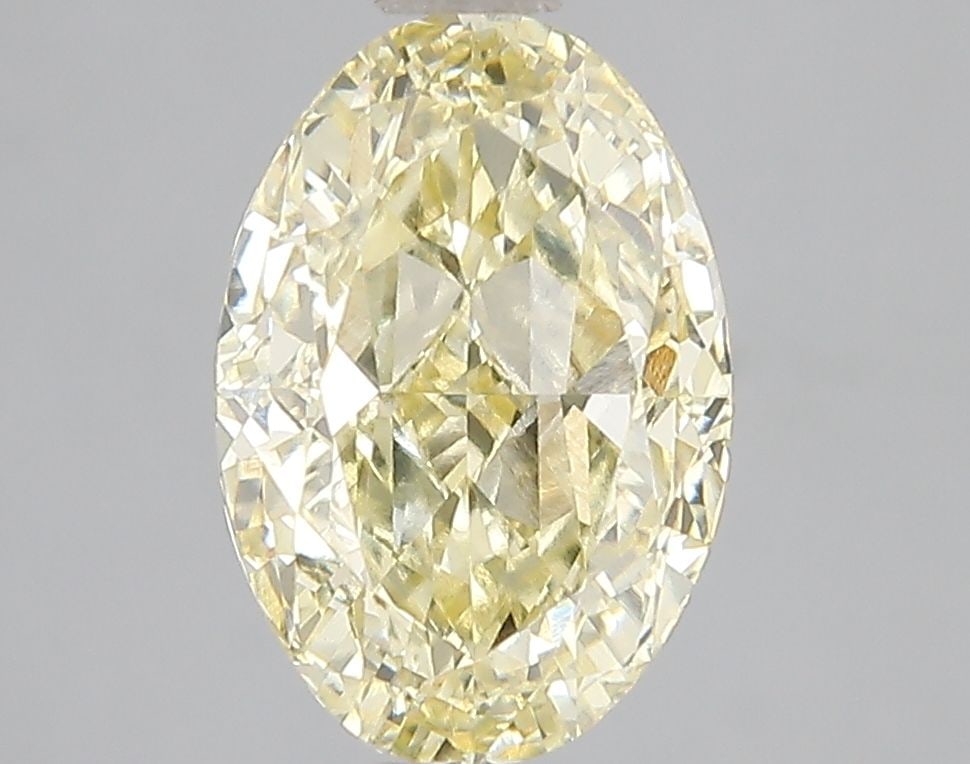 Loose Diamond - OVAL 3.07ct Fancy Vivid Yellow VVS2: Loose Diamond - OVAL 3.07ct Fancy Vivid Yellow VVS2 Source: This is a real non-mined Diamond that has been grown in a lab Shape: OVAL Carats: 3.07 Color: Fancy Vivid Yellow Certification: IGI Video: