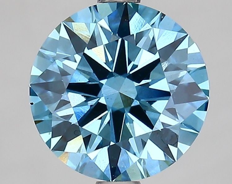Ideal Loose Diamond - ROUND 2.19ct Fancy Vivid Blue VS1: Ideal Loose Diamond - ROUND 2.19ct Fancy Vivid Blue VS1 Source: This is a real non-mined Diamond that has been grown in a lab Shape: ROUND Carats: 2.19 Color: Fancy Vivid Blue Certification: IGI Video