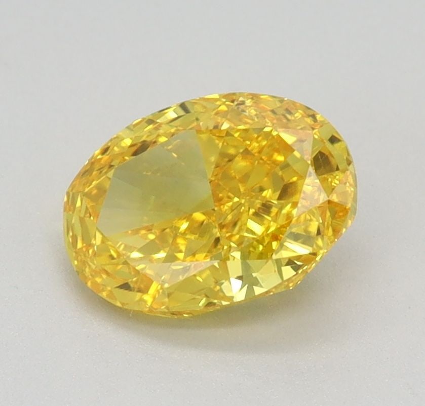 Loose Diamond - OVAL 0.9ct Fancy Vivid Yellow VS1: Loose Diamond - OVAL 0.9ct Fancy Vivid Yellow VS1 Source: This is a real non-mined Diamond that has been grown in a lab Shape: OVAL Carats: 0.9 Color: Fancy Vivid Yellow Certification: IGI Video: