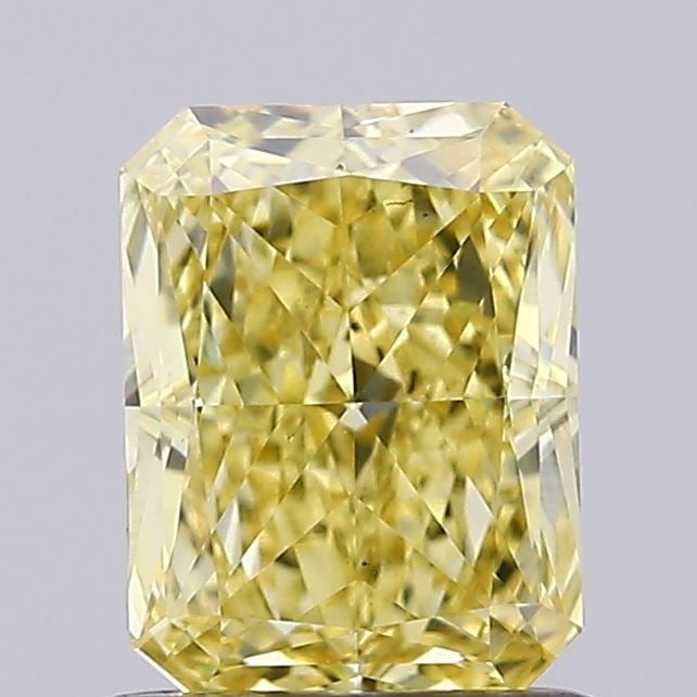 Loose Diamond - RADIANT 1.11ct Fancy Vivid Yellow VS1: Loose Diamond - RADIANT 1.11ct Fancy Vivid Yellow VS1 Source: This is a real non-mined Diamond that has been grown in a lab Shape: RADIANT Carats: 1.11 Color: Fancy Vivid Yellow Certification: IGI Vid