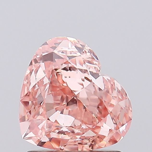 Loose Diamond - HEART 1.72ct Fancy Intense Orangey Pink VVS2: Loose Diamond - HEART 1.72ct Fancy Intense Orangey Pink VVS2 Source: This is a real non-mined Diamond that has been grown in a lab Shape: HEART Carats: 1.72 Color: Fancy Intense Orangey Pink Certifica