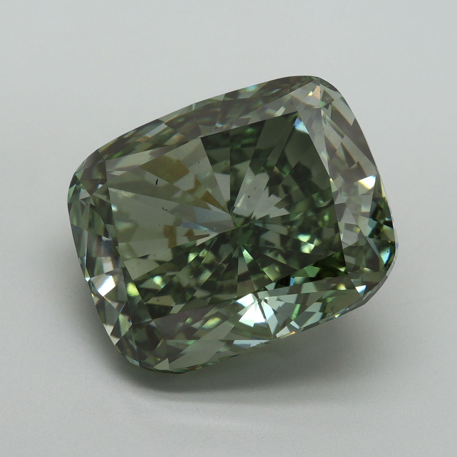 Loose Diamond - CUSHION BRILLIANT 21.14ct Fancy Vivid Green VS1: Loose Diamond - CUSHION BRILLIANT 21.14ct Fancy Vivid Green VS1 Source: This is a real non-mined Diamond that has been grown in a lab Shape: CUSHION BRILLIANT Carats: 21.14 Color: Fancy Vivid Green Ce