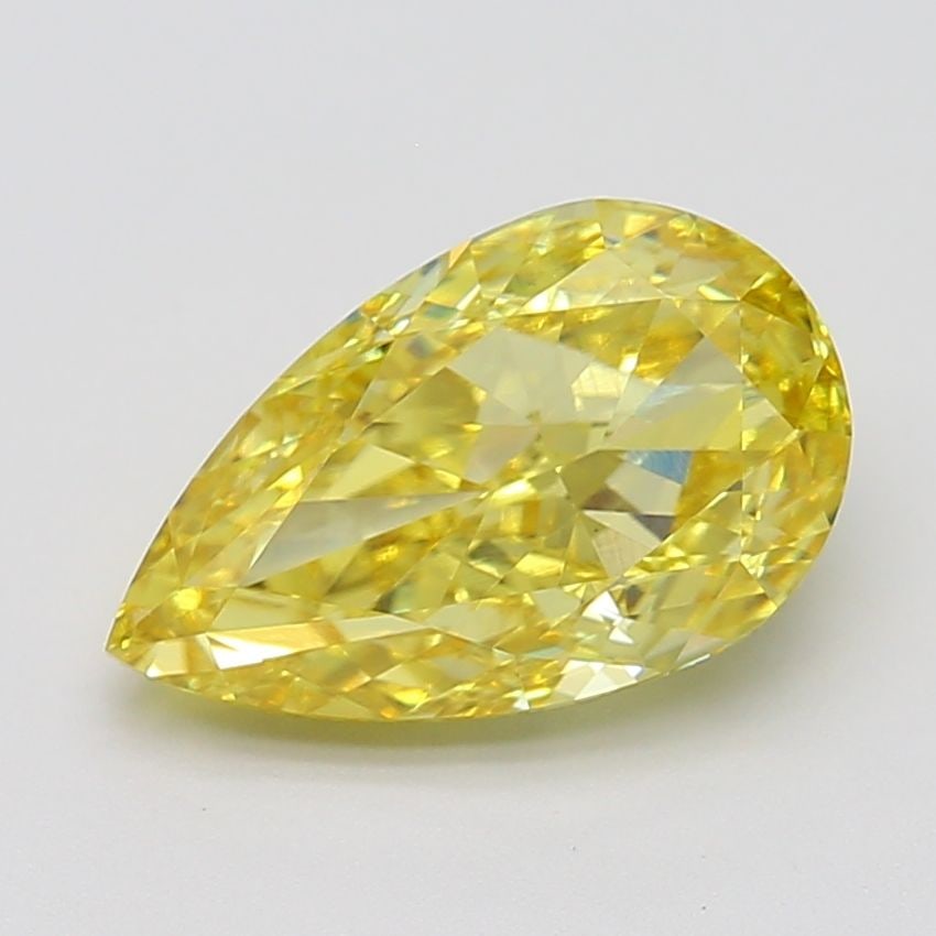 Loose Diamond - PEAR 3.44ct Fancy Vivid Yellow VS1: Loose Diamond - PEAR 3.44ct Fancy Vivid Yellow VS1 Source: This is a real non-mined Diamond that has been grown in a lab Shape: PEAR Carats: 3.44 Color: Fancy Vivid Yellow Certification: IGI Video: