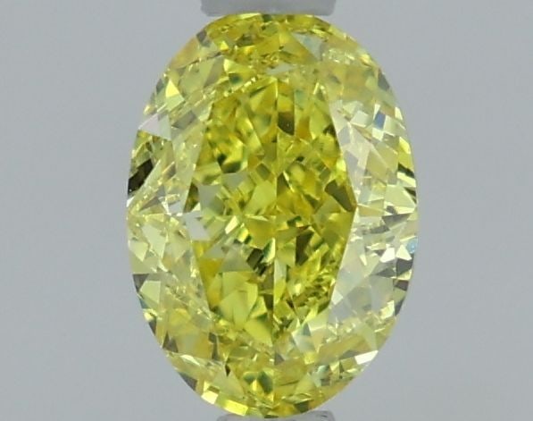 Loose Diamond - OVAL 1.07ct Fancy Vivid Yellow VVS2: Loose Diamond - OVAL 1.07ct Fancy Vivid Yellow VVS2 Source: This is a real non-mined Diamond that has been grown in a lab Shape: OVAL Carats: 1.07 Color: Fancy Vivid Yellow Certification: IGI Video: