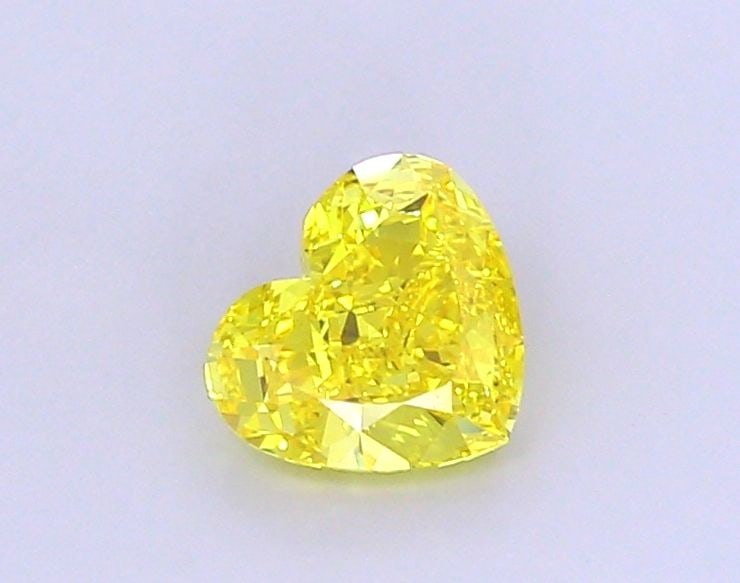 Loose Diamond - HEART 1.66ct Fancy Vivid Yellow VVS2: Loose Diamond - HEART 1.66ct Fancy Vivid Yellow VVS2 Source: This is a real non-mined Diamond that has been grown in a lab Shape: HEART Carats: 1.66 Color: Fancy Vivid Yellow Certification: IGI Video: