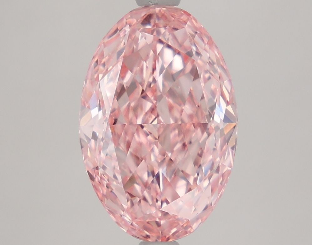 Loose Diamond - OVAL 2.92ct Fancy Vivid Pink VVS2: Loose Diamond - OVAL 2.92ct Fancy Vivid Pink VVS2 Source: This is a real non-mined Diamond that has been grown in a lab Shape: OVAL Carats: 2.92 Color: Fancy Vivid Pink Certification: IGI Video: