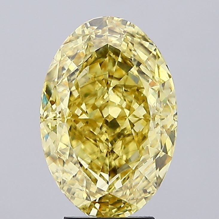 Loose Diamond - OVAL 5.41ct Fancy Vivid Yellow VS2: Loose Diamond - OVAL 5.41ct Fancy Vivid Yellow VS2 Source: This is a real non-mined Diamond that has been grown in a lab Shape: OVAL Carats: 5.41 Color: Fancy Vivid Yellow Certification: IGI Video: