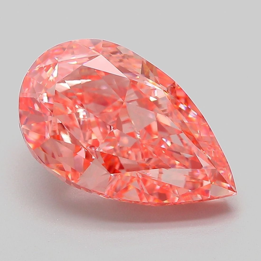 Loose Diamond - PEAR 6.09ct Fancy Vivid Pink VVS2: Loose Diamond - PEAR 6.09ct Fancy Vivid Pink VVS2 Source: This is a real non-mined Diamond that has been grown in a lab Shape: PEAR Carats: 6.09 Color: Fancy Vivid Pink Certification: IGI Video: