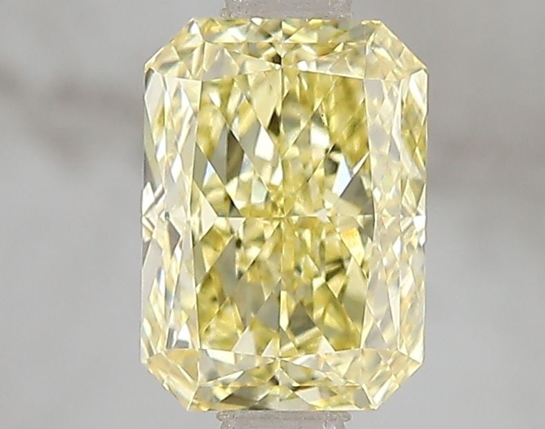 Loose Diamond - RADIANT 1.57ct Fancy Vivid Yellow VS1: Loose Diamond - RADIANT 1.57ct Fancy Vivid Yellow VS1 Source: This is a real non-mined Diamond that has been grown in a lab Shape: RADIANT Carats: 1.57 Color: Fancy Vivid Yellow Certification: IGI Vid