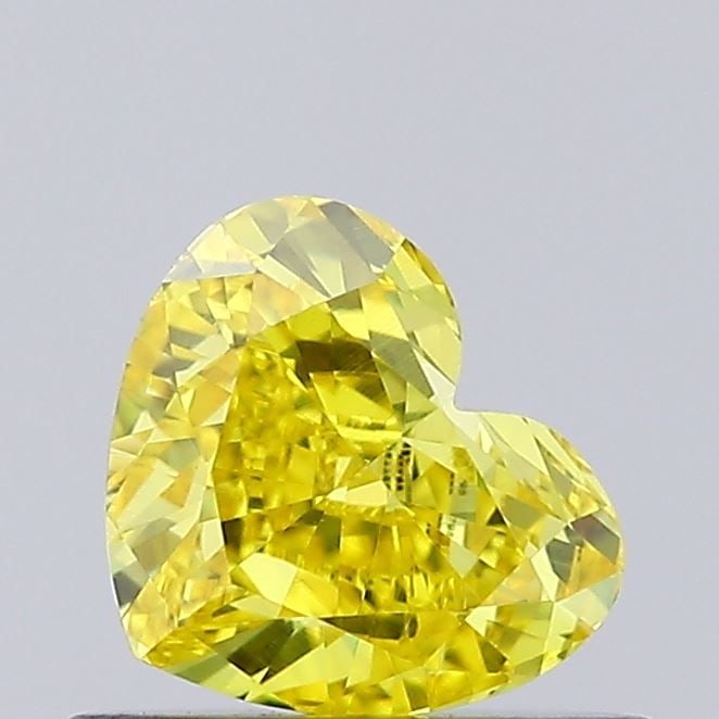 Loose Diamond - HEART 0.47ct Fancy Vivid Yellow VS1: Loose Diamond - HEART 0.47ct Fancy Vivid Yellow VS1 Source: This is a real non-mined Diamond that has been grown in a lab Shape: HEART Carats: 0.47 Color: Fancy Vivid Yellow Certification: IGI Video: