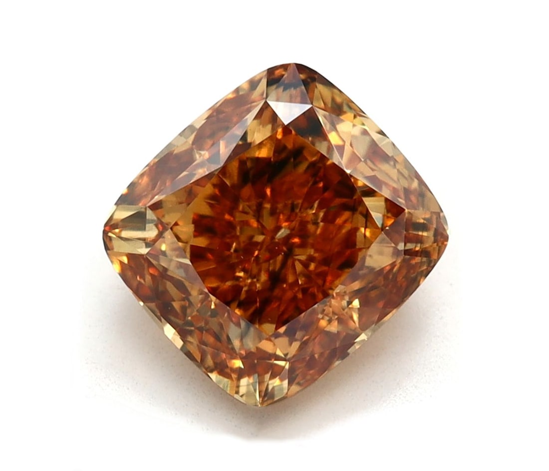 Loose Diamond - CUSHION MODIFIED 1.45ct Fancy Intense Brownish Yellow SI2: Loose Diamond - CUSHION MODIFIED 1.45ct Fancy Intense Brownish Yellow SI2 Source: This is a real non-mined Diamond that has been grown in a lab Shape: CUSHION MODIFIED Carats: 1.45 Color: Fancy Intens