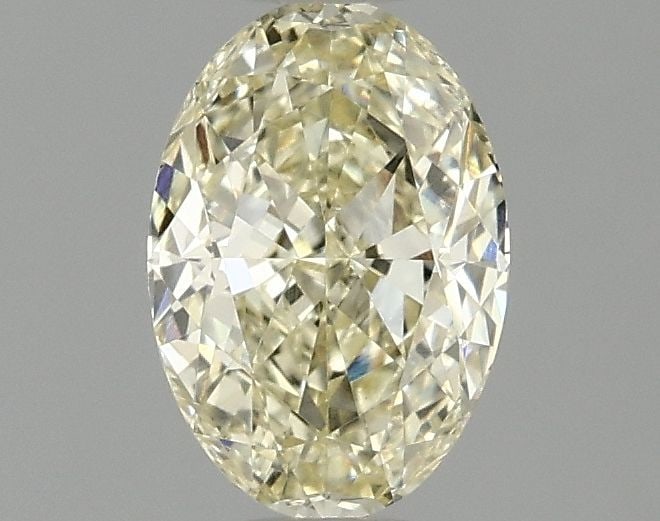 Loose Diamond - OVAL 1.02ct Fancy Yellow VVS2: Loose Diamond - OVAL 1.02ct Fancy Yellow VVS2 Source: This is a real non-mined Diamond that has been grown in a lab Shape: OVAL Carats: 1.02 Color: Fancy Yellow Certification: IGI Video: