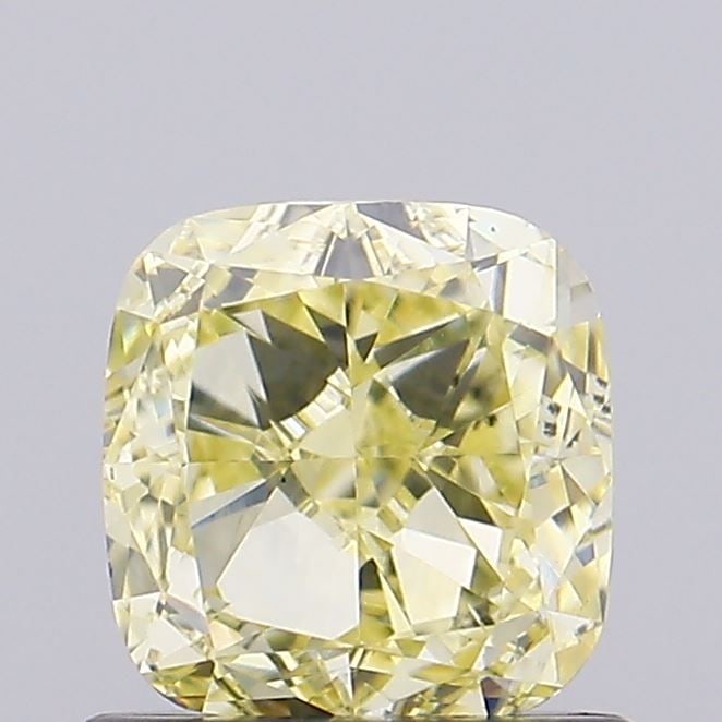 Loose Diamond - CUSHION BRILLIANT 0.81ct Fancy Intense Yellow VS2: Loose Diamond - CUSHION BRILLIANT 0.81ct Fancy Intense Yellow VS2 Source: This is a real non-mined Diamond that has been grown in a lab Shape: CUSHION BRILLIANT Carats: 0.81 Color: Fancy Intense Yello