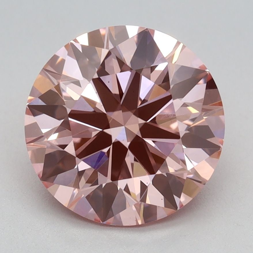 Ideal Loose Diamond - ROUND 2.15ct Fancy Vivid Pink VS2: Ideal Loose Diamond - ROUND 2.15ct Fancy Vivid Pink VS2 Source: This is a real non-mined Diamond that has been grown in a lab Shape: ROUND Carats: 2.15 Color: Fancy Vivid Pink Certification: IGI Video