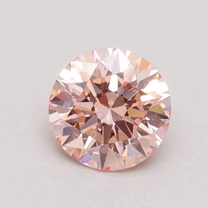 Loose Diamond - ROUND 0.65ct Fancy Intense Pink VS1: Loose Diamond - ROUND 0.65ct Fancy Intense Pink VS1 Source: This is a real non-mined Diamond that has been grown in a lab Shape: ROUND Carats: 0.65 Color: Fancy Intense Pink Certification: IGI Video: