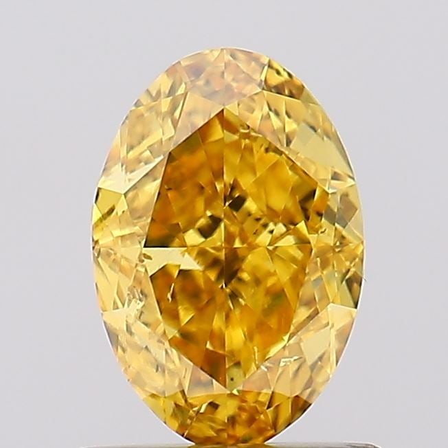 Loose Diamond - OVAL 1.0ct Fancy Vivid Brownish Yellow SI1: Loose Diamond - OVAL 1.0ct Fancy Vivid Brownish Yellow SI1 Source: This is a real non-mined Diamond that has been grown in a lab Shape: OVAL Carats: 1.0 Color: Fancy Vivid Brownish Yellow Certificatio