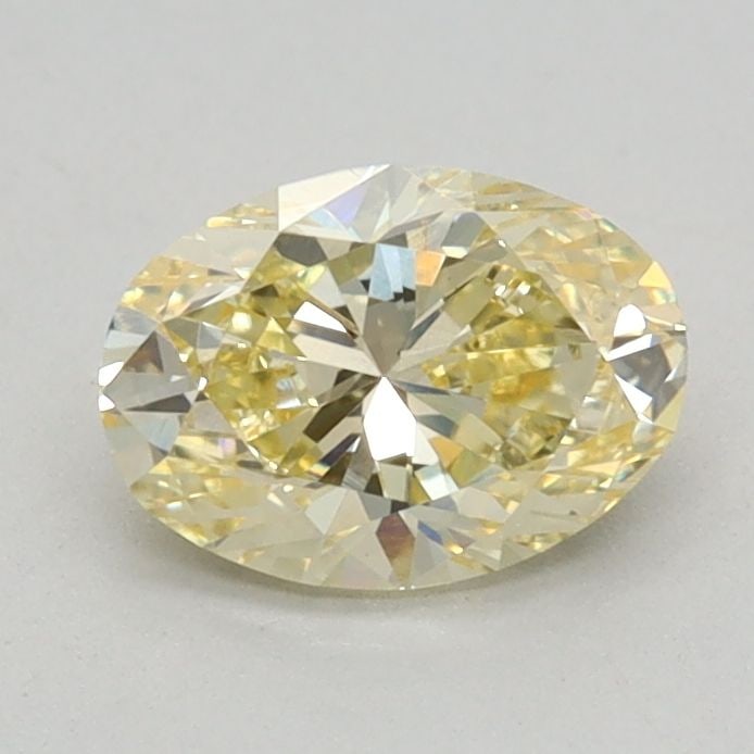 Loose Diamond - OVAL 0.62ct Fancy Yellow VS1: Loose Diamond - OVAL 0.62ct Fancy Yellow VS1 Source: This is a real non-mined Diamond that has been grown in a lab Shape: OVAL Carats: 0.62 Color: Fancy Yellow Certification: IGI Video:
