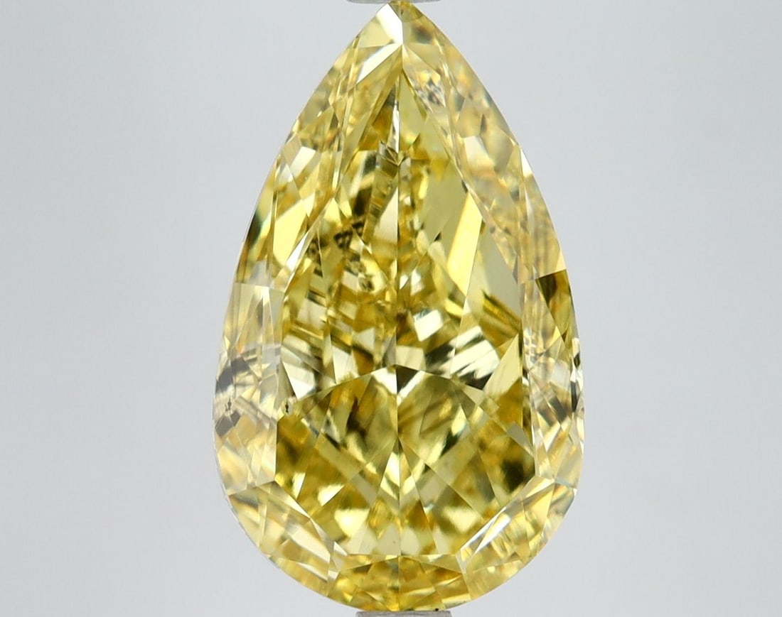 Loose Diamond - PEAR 5.0ct Fancy Vivid Yellow VS2: Loose Diamond - PEAR 5.0ct Fancy Vivid Yellow VS2 Source: This is a real non-mined Diamond that has been grown in a lab Shape: PEAR Carats: 5.0 Color: Fancy Vivid Yellow Certification: IGI Video: