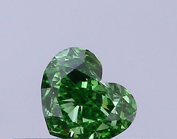 Loose Diamond - HEART 0.21ct Fancy Vivid Green VS1: Loose Diamond - HEART 0.21ct Fancy Vivid Green VS1 Source: This is a real non-mined Diamond that has been grown in a lab Shape: HEART Carats: 0.21 Color: Fancy Vivid Green Certification: IGI Video: