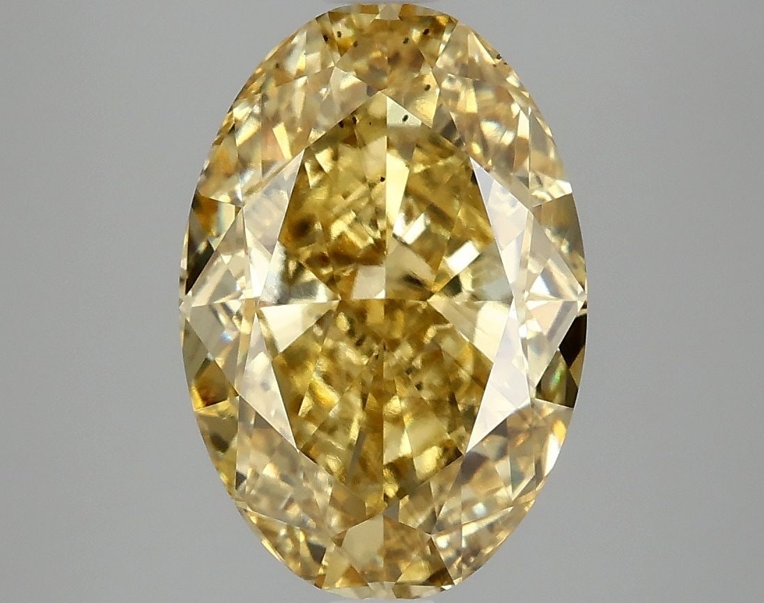 Loose Diamond - OVAL 5.06ct Fancy Vivid Yellow SI1: Loose Diamond - OVAL 5.06ct Fancy Vivid Yellow SI1 Source: This is a real non-mined Diamond that has been grown in a lab Shape: OVAL Carats: 5.06 Color: Fancy Vivid Yellow Certification: IGI Video: