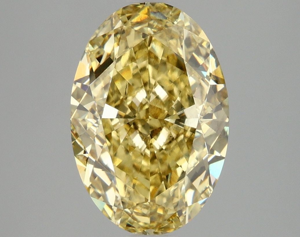 Loose Diamond - OVAL 4.08ct Fancy Vivid Yellow VS2: Loose Diamond - OVAL 4.08ct Fancy Vivid Yellow VS2 Source: This is a real non-mined Diamond that has been grown in a lab Shape: OVAL Carats: 4.08 Color: Fancy Vivid Yellow Certification: IGI Video: