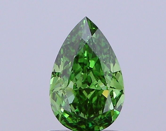 Loose Diamond - PEAR 0.91ct Fancy Vivid Green VS1: Loose Diamond - PEAR 0.91ct Fancy Vivid Green VS1 Source: This is a real non-mined Diamond that has been grown in a lab Shape: PEAR Carats: 0.91 Color: Fancy Vivid Green Certification: IGI Video: