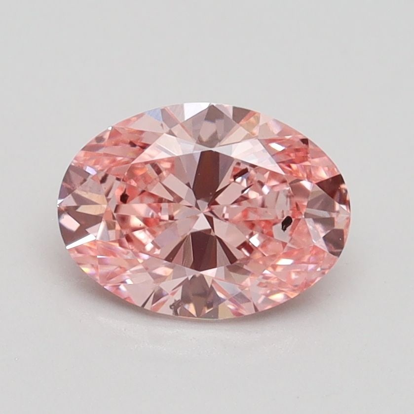 Loose Diamond - OVAL 1.1ct Fancy Vivid Pink SI1: Loose Diamond - OVAL 1.1ct Fancy Vivid Pink SI1 Source: This is a real non-mined Diamond that has been grown in a lab Shape: OVAL Carats: 1.1 Color: Fancy Vivid Pink Certification: IGI Video: