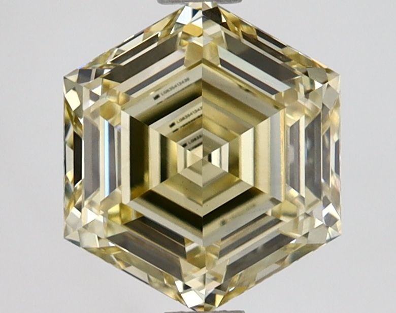 Loose Diamond - HEXAGONAL 2.03ct Fancy Yellow VS1: Loose Diamond - HEXAGONAL 2.03ct Fancy Yellow VS1 Source: This is a real non-mined Diamond that has been grown in a lab Shape: HEXAGONAL Carats: 2.03 Color: Fancy Yellow Certification: IGI Video: