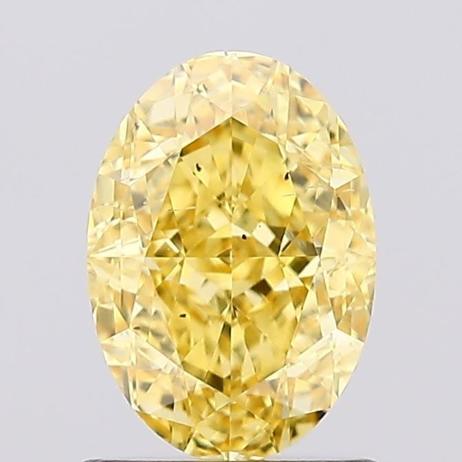 Loose Diamond - OVAL 1.21ct Fancy Vivid Yellow SI1: Loose Diamond - OVAL 1.21ct Fancy Vivid Yellow SI1 Source: This is a real non-mined Diamond that has been grown in a lab Shape: OVAL Carats: 1.21 Color: Fancy Vivid Yellow Certification: IGI Video: