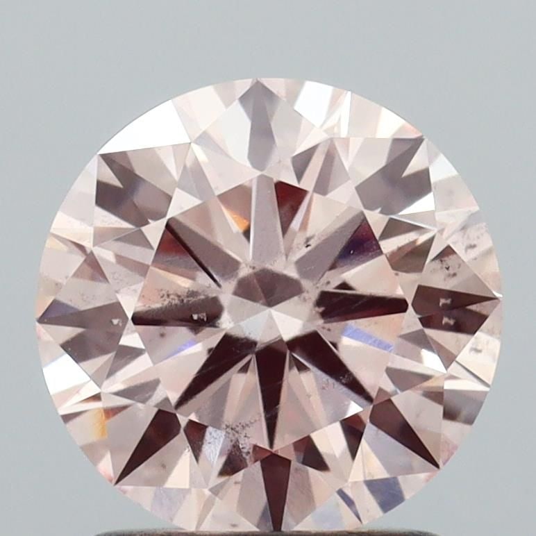 Ideal Loose Diamond - ROUND 1.51ct Fancy Pink SI1: Ideal Loose Diamond - ROUND 1.51ct Fancy Pink SI1 Source: This is a real non-mined Diamond that has been grown in a lab Shape: ROUND Carats: 1.51 Color: Fancy Pink Certification: IGI Video: