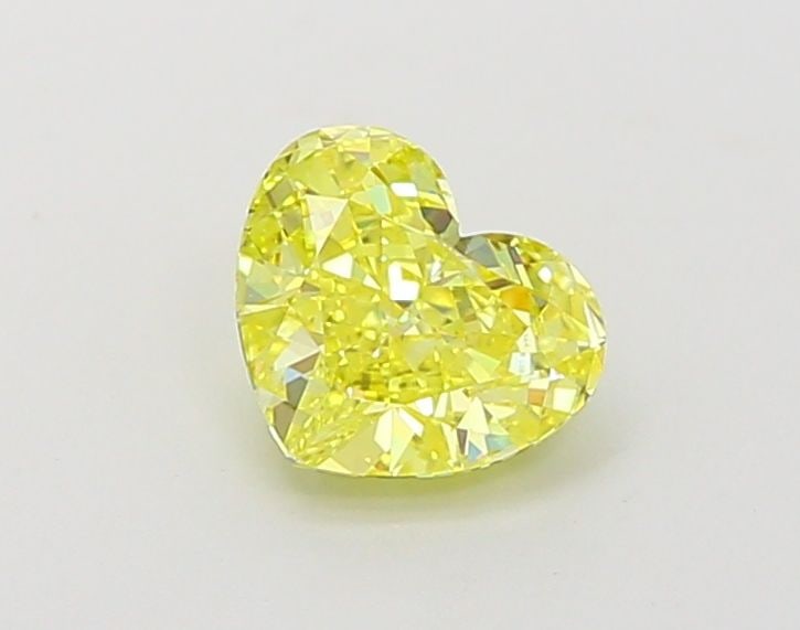 Loose Diamond - HEART 1.0ct Fancy Vivid Yellow VS1: Loose Diamond - HEART 1.0ct Fancy Vivid Yellow VS1 Source: This is a real non-mined Diamond that has been grown in a lab Shape: HEART Carats: 1.0 Color: Fancy Vivid Yellow Certification: IGI Video: