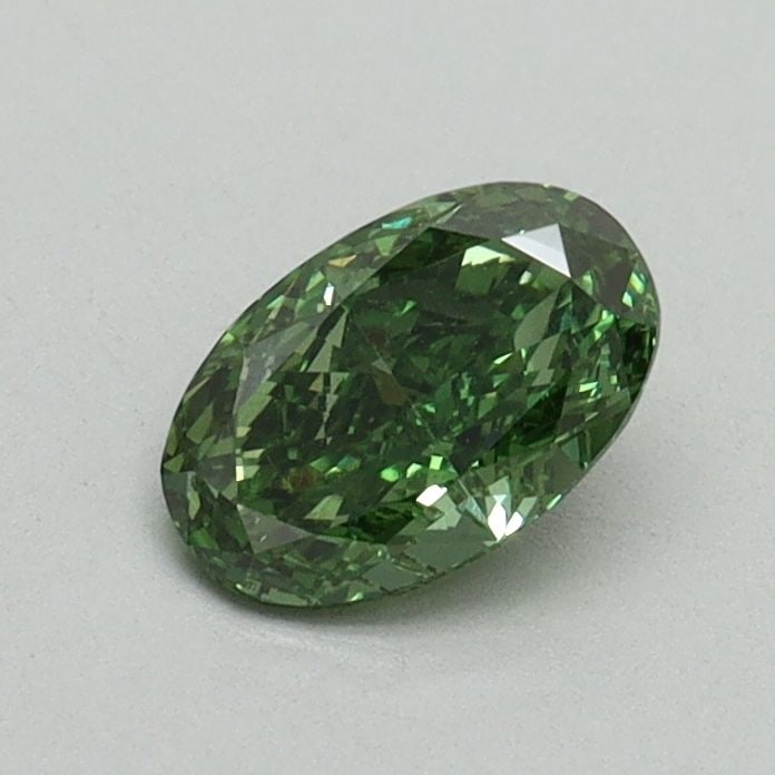 Loose Diamond - OVAL 0.53ct Fancy Vivid Green VVS2: Loose Diamond - OVAL 0.53ct Fancy Vivid Green VVS2 Source: This is a real non-mined Diamond that has been grown in a lab Shape: OVAL Carats: 0.53 Color: Fancy Vivid Green Certification: IGI Video: