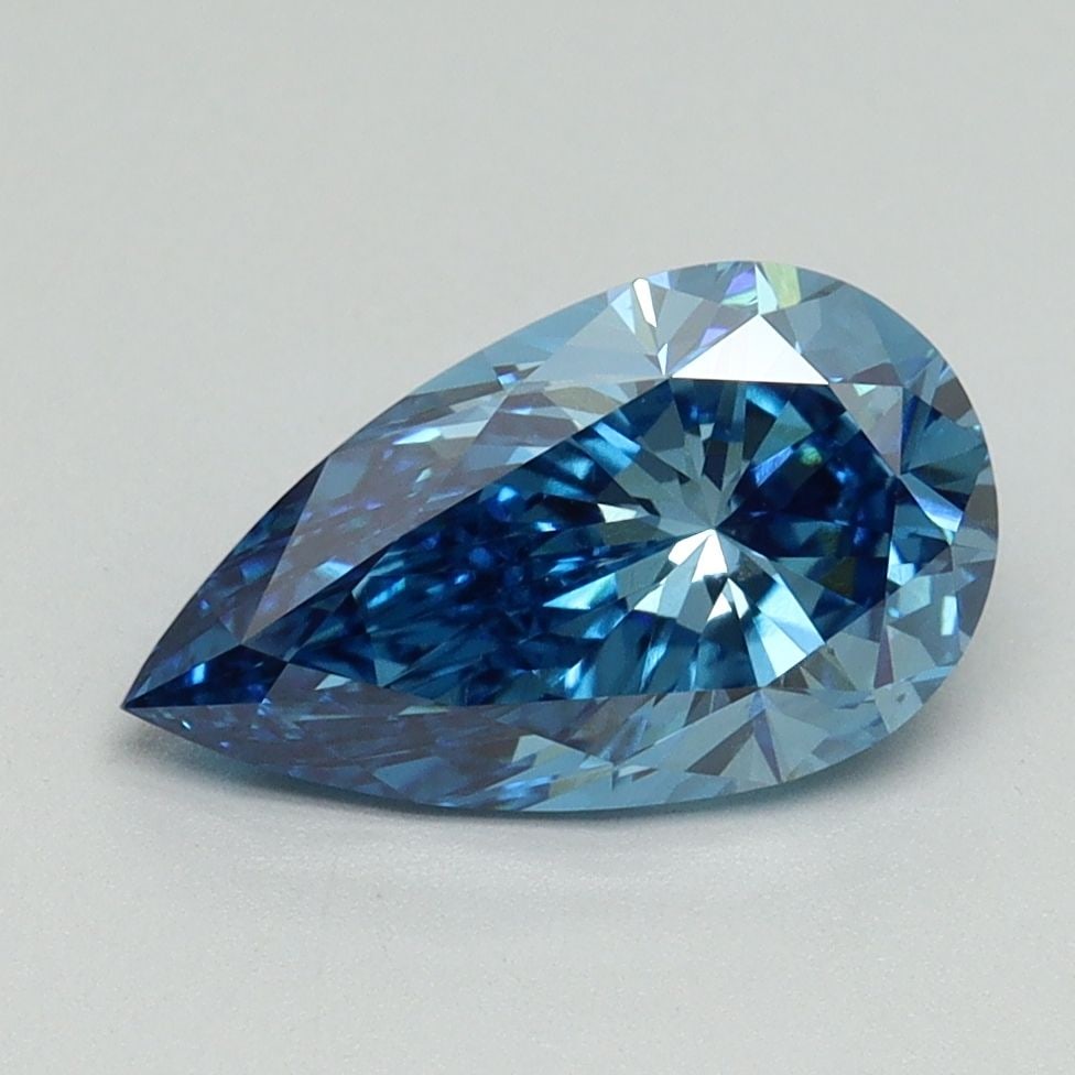 Loose Diamond - PEAR 1.83ct Fancy Vivid Blue VS1: Loose Diamond - PEAR 1.83ct Fancy Vivid Blue VS1 Source: This is a real non-mined Diamond that has been grown in a lab Shape: PEAR Carats: 1.83 Color: Fancy Vivid Blue Certification: IGI Video: