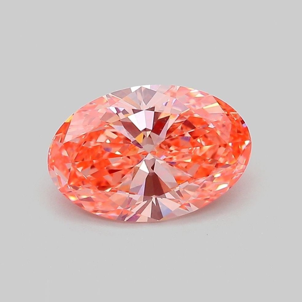 Loose Diamond - OVAL 2.26ct Fancy Vivid Orange Pink VVS2: Loose Diamond - OVAL 2.26ct Fancy Vivid Orange Pink VVS2 Source: This is a real non-mined Diamond that has been grown in a lab Shape: OVAL Carats: 2.26 Color: Fancy Vivid Orange Pink Certification: IG