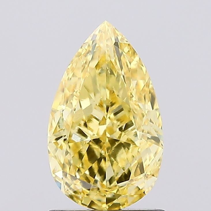 Loose Diamond - PEAR 1.37ct Fancy Vivid Yellow VS1: Loose Diamond - PEAR 1.37ct Fancy Vivid Yellow VS1 Source: This is a real non-mined Diamond that has been grown in a lab Shape: PEAR Carats: 1.37 Color: Fancy Vivid Yellow Certification: IGI Video: